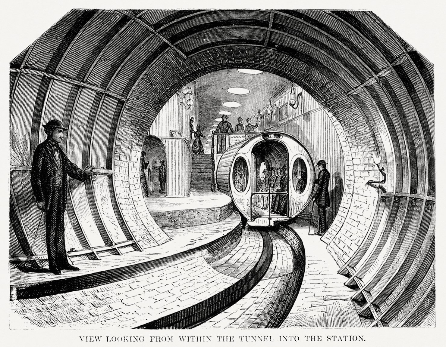 Illustration of the view when looking from within the tunnel into the station from Illustrated description of the Broadway underground railway (1872)